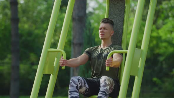 Exercising in an outdoor gym