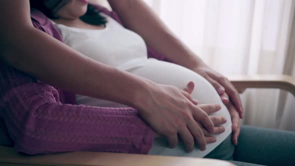 Pregnant Couple Feels Love and Relax at Home