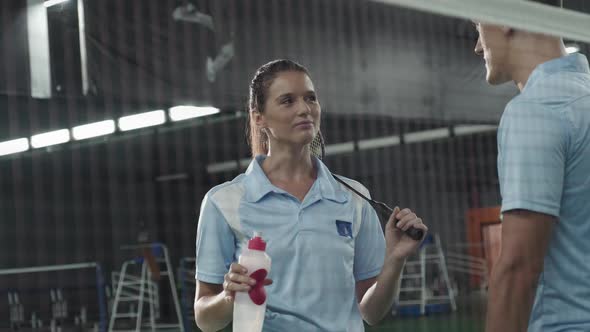 Female Tennis Player Chatting with Opponent on Break