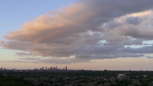 Wide shot time-lapse of Mississauga city and surrounding landscape