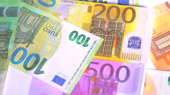 Euro currency banknotes background. European paper money backdrop with 100, 200 and 500 euros bills.