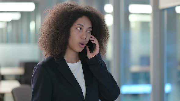 Portrait of African Businesswoman Talking on Smartphone