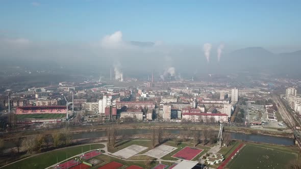 Aerial Shot Of The Factory And Chimney In The City