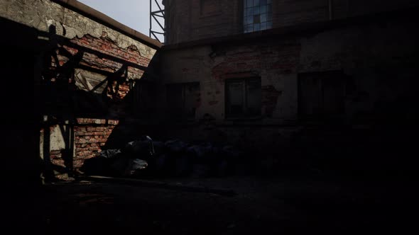 Abandoned Industrial Factory Buildings at Sunset alt