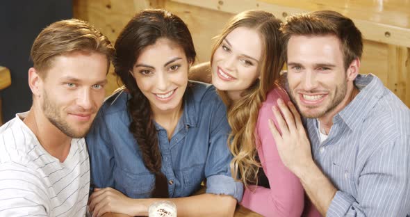 Group of friends taking selfie with mobile phone 4k