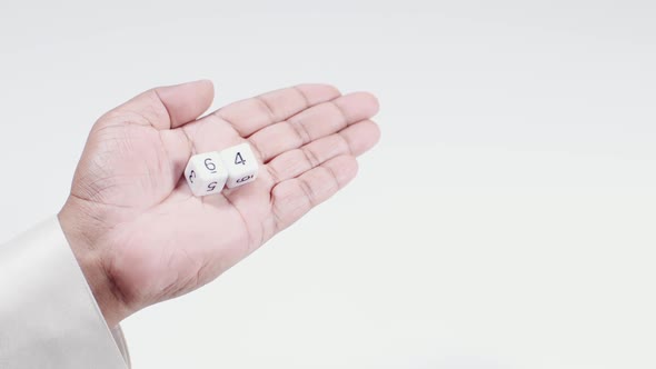 Hand Holds Numbered Dice   Six And Four Sixty Four