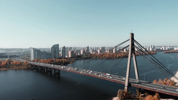 Aerial View of Concrete Bridge with Cars at Rush Hour in Industrial City