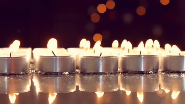 View of candles burning