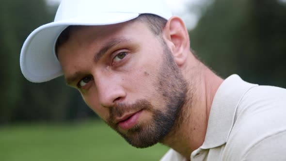 Young sportsman on the golf course