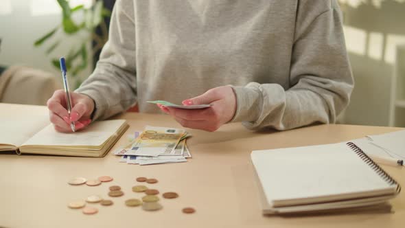 Housewife Counting Money for Monthly Expenses Rich Woman Holding a Stack of Euro in Hands