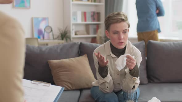 Woman Talking Emotionally to Psychologist