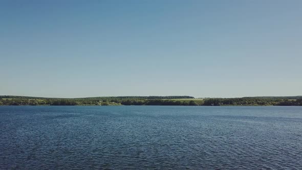 wonderful view of the wide river not far from shore in the summer