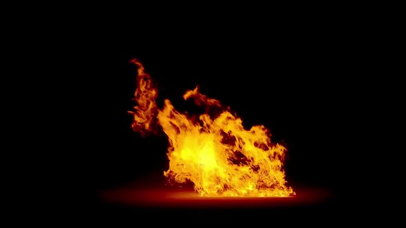 Huge bonfire in the wind on a black background alt