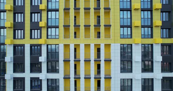 Multi-story building with Windows and loggias.