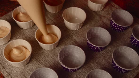 Small Molds for Cupcakes on Napkin on Table