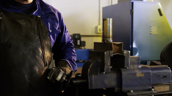 Welder welding a metal