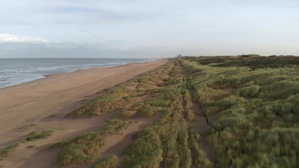 Offshore Dunes With Lush Beachgrasses At Katwijk Beach, Zuid-Holland, Northern Netherlands. Aerial D