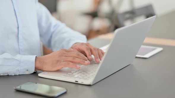 African Man Opening Typing and Closing Laptop Close Up