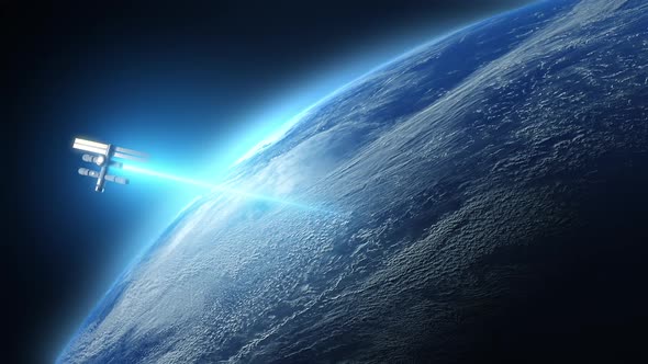 A space station in space orbiting the globe emits a blue laser beam toward earth