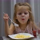 Little Girl Eats Pasta at Lunch - VideoHive Item for Sale