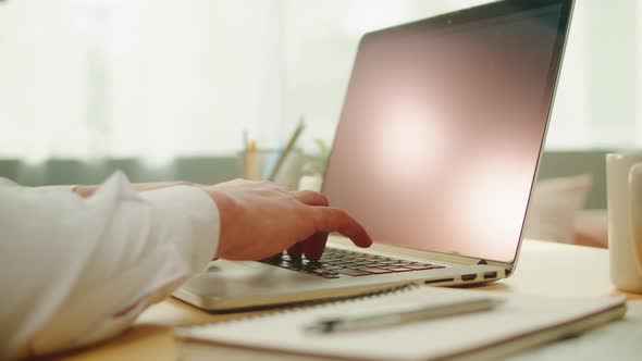 Businessman Using Laptop Closeup