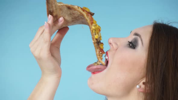 Woman Eating Hot Fresh Pizza