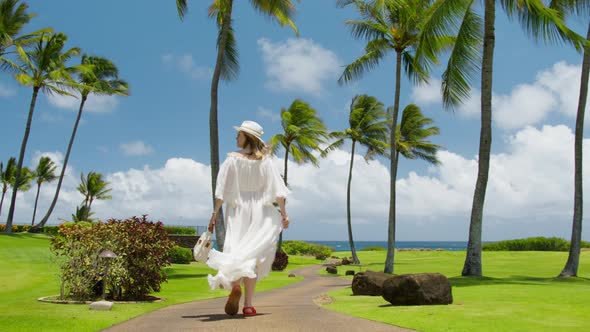 Dream Trip Holiday Travel Concept of Happy Free Woman Walking in White Dress US