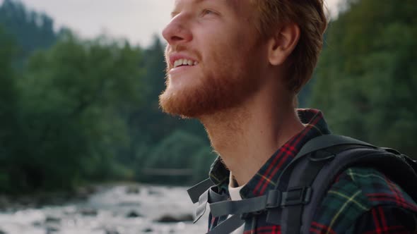 Happy Guy Holding Photo Camera