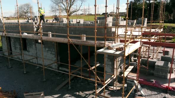 Male engineer inspecting the work at construction site 4k