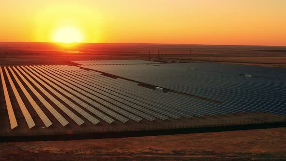 Aerial View of Solar Power Station at Sunset