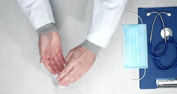 Professional doctor working at office desk