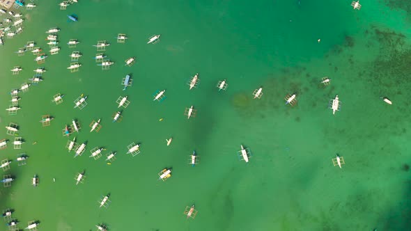 Tourist Boats in a Bay with Blue Water