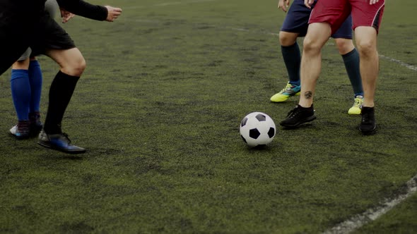 Soccer Player Makes a Dribble Feint Between Defender's Legs