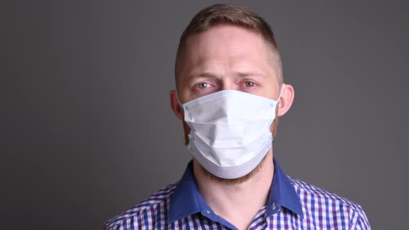 The Covid Epidemic Is Over. A Man Takes Off His Mask, Safety From Viruses.