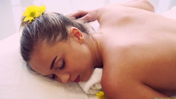 Woman Gets Back Massage Spa By Massage Therapist