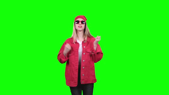 Girl in Stylish Clothes Worries About the Game of Her Team. Green Screen