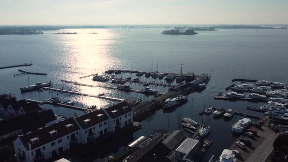 Marina in loosdrecht in the netherlands with backlight, aerial view