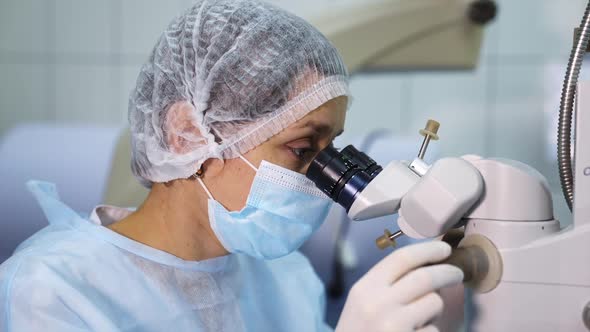 Close up of patient eye treatment. Modern microscope for operations in surgery room at the hospital