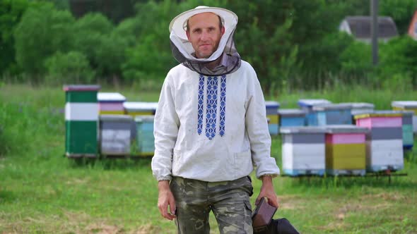 Beekeeper at the apiary.