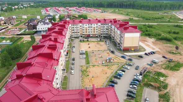 New Building in the Suburbs Flight Over a New Modern Apartment Building