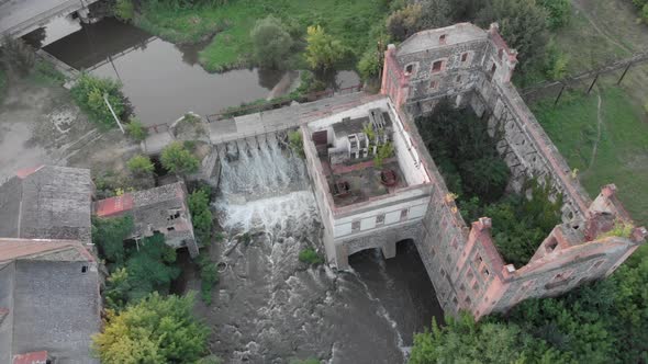 Old abandoned mill with waterfall.