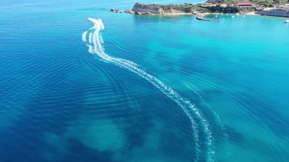 Aerial View of a Motor Boat Towing a Tube, Zakynthos, Greece