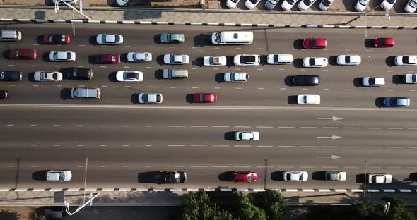 Aerial Drone Flight Top Down View of Freeway Busy City Rush Hour Heavy Traffic Jam Highway