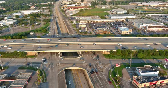 Aerial view shopping district parking lot near major road 45 interchanges