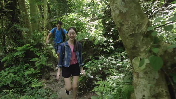 Asian Couple Hiking