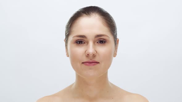 Studio portrait of young, beautiful and natural blond woman