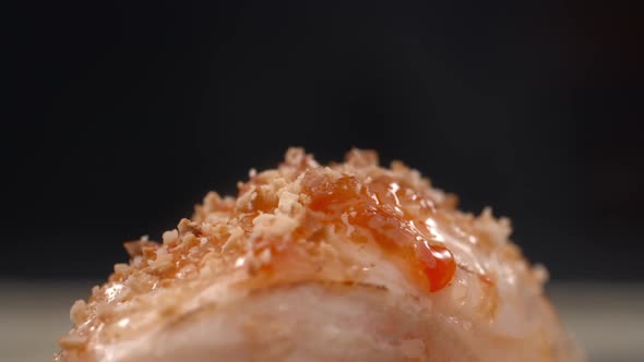 Sushi Roll Is Sprinkled with Grinded Walnuts in Slow Motion, Ooking Sashimi, Asian Food Restaurant