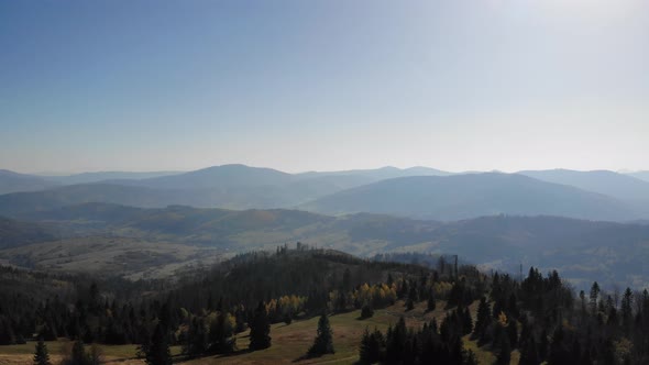 Flight over autumn mountains