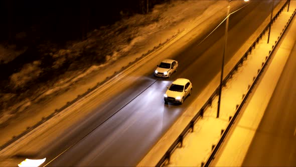 Aerial View of The Traffic on The Road in The Winter Night