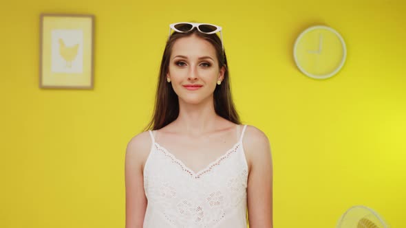 Portrait of Smiling Woman In White Top